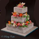 wedding cake with various flowers
